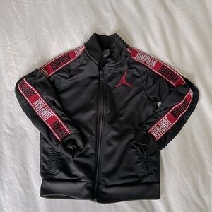 Air Jordan zippered top.  Child size M (5-6 Y)